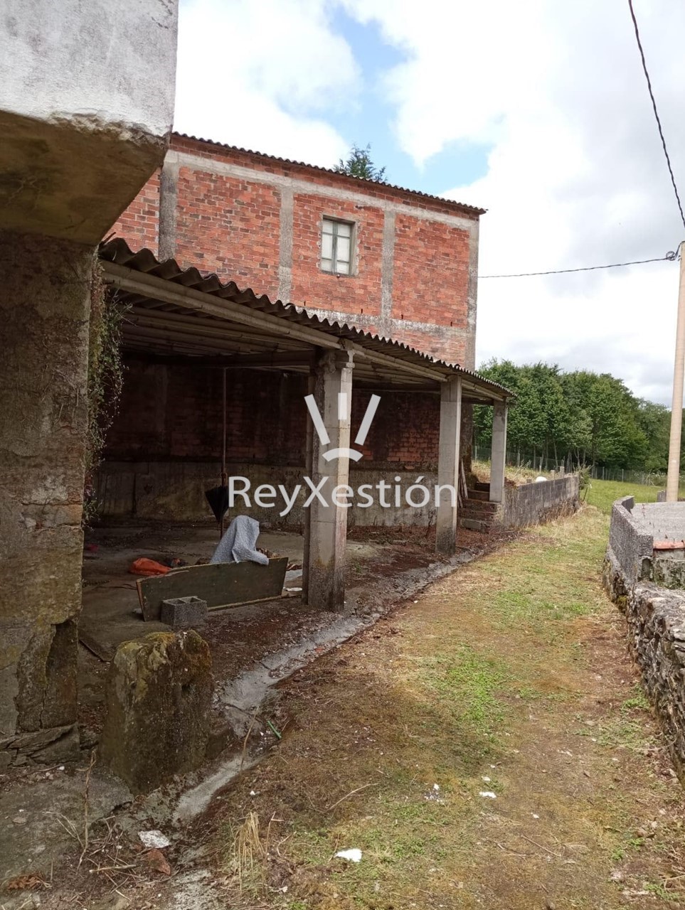 Foto 5 CASA UNIFAMILIAR CON TERRENO Y DOS NAVES EN LAVACOLLA