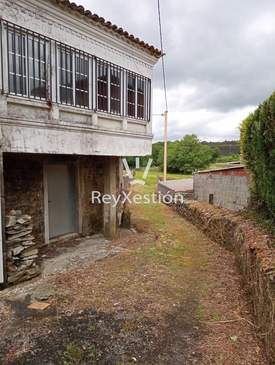 Foto 6 CASA UNIFAMILIAR CON TERRENO Y DOS NAVES EN LAVACOLLA